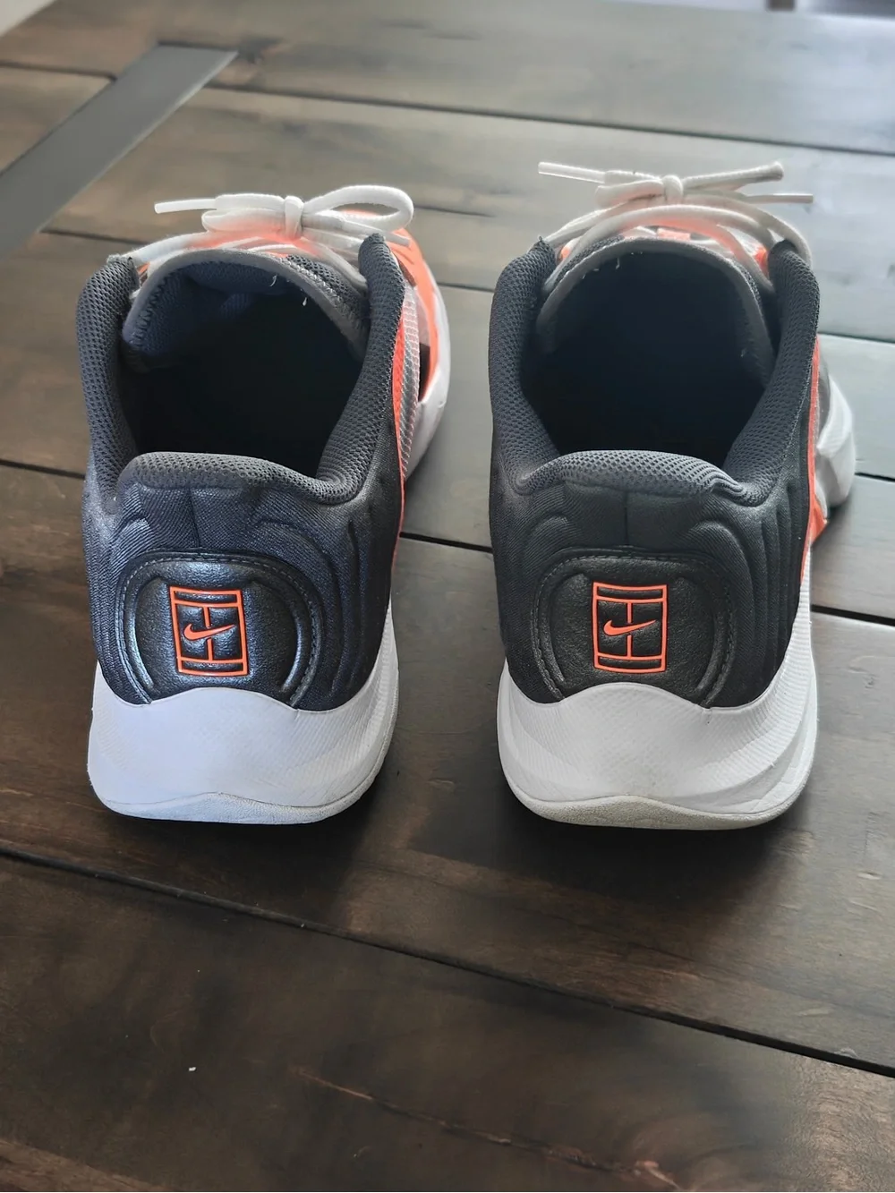 Nike Gray and Orange Athletic Sneakers with White Swoosh